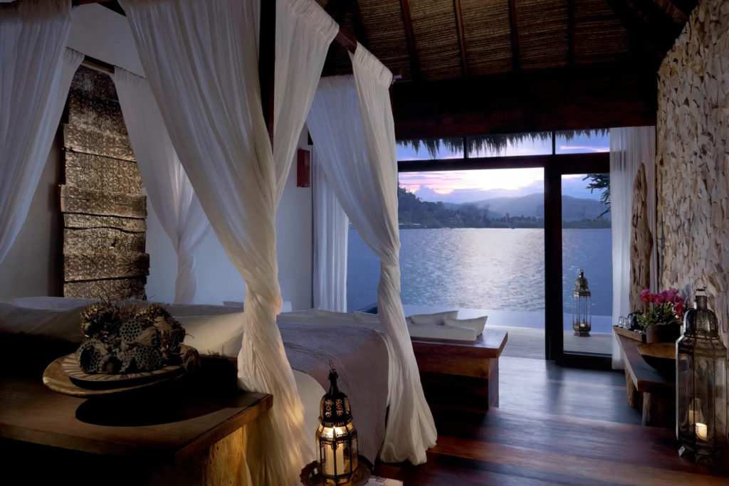 Song-Saa-Private-Island__2018_song-saa-private-island-one-bedroom-over-water-villa-interior-view-bed