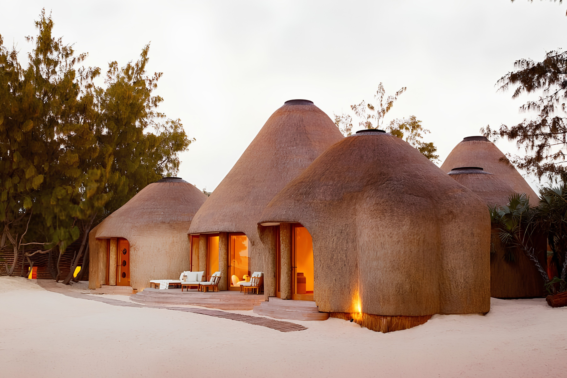 Thatched private residences at Kisawa Sanctuary, a luxury resort on Benguerra Island in Mozambique.
